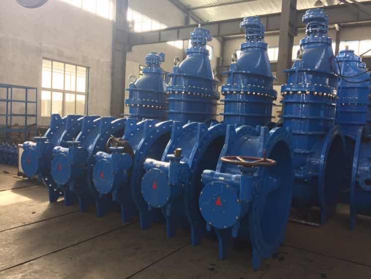 Blue ductile iron valves in a workshop